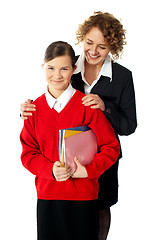 Image showing Teacher with teen student