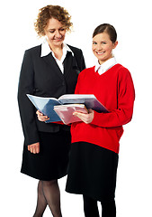 Image showing Beautiful child with teacher, shot in studio