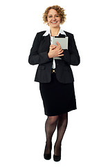 Image showing Female excutive holding apple i-pad