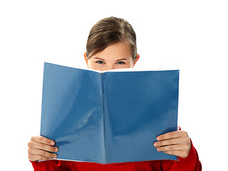 Image showing Intelligent school girl reading study book