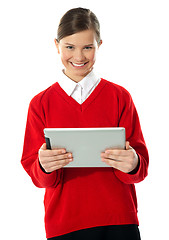 Image showing School girl holding tablet computer