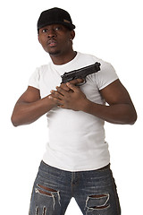 Image showing Young thug with a gun