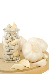 Image showing Garlic and herbal supplement pills isolated, alternative medicine concept