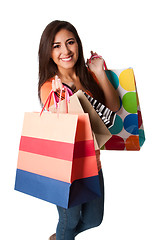 Image showing Happy young woman on shopping spree