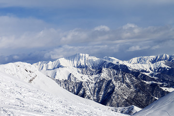 Image showing Ski slope and snowy mountains