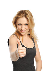 Image showing Young beautiful woman thumbs up