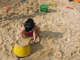 Image showing Little Girl Playing With Sand