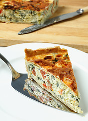 Image showing Serving spinach beet quiche