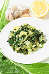 Image showing Swiss chard with garlic and lemon vertical