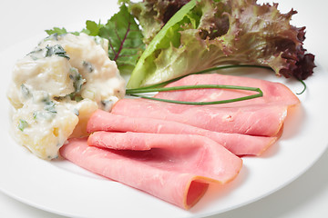 Image showing Sliced smoked beef and salad side view