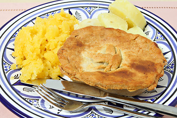 Image showing Homemade pie with swede and potato