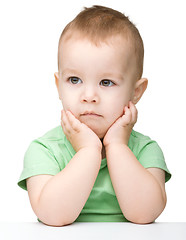 Image showing Portrait of a cute and pensive little boy