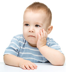 Image showing Portrait of a cute and pensive little boy