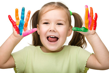 Image showing Cheerful girl with painted hands