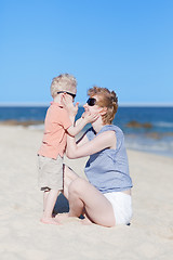 Image showing mother and son together at the beach