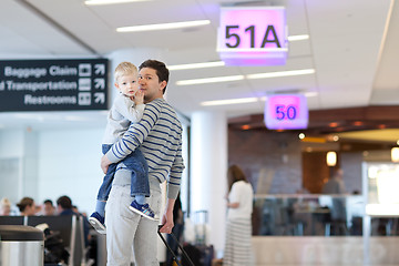 Image showing father and son at the airport