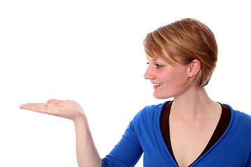 Image showing Woman with Palm of hand up in profile