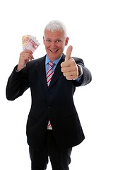 Image showing Businessman with thumb up and money