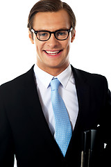 Image showing Closeup of smiling corporate young man