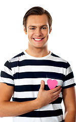 Image showing Casual man with a paper heart