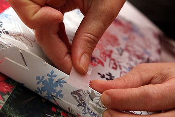 Image showing wrapping gifts