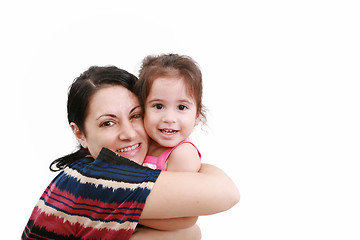 Image showing beautiful young mother and her two year old daughter looking at 