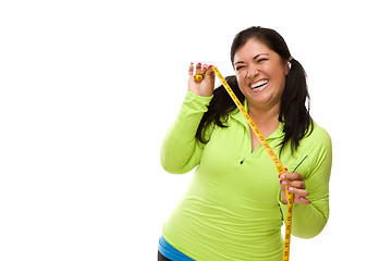 Image showing Hispanic Woman In Workout Clothes with Tape Measure