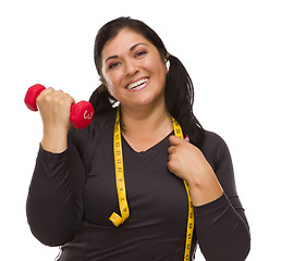 Image showing Hispanic Woman with Tape Measure Lifting Dumbbell
