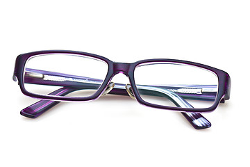 Image showing A pair of purple glasses