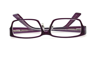 Image showing A pair of purple glasses