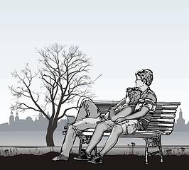 Image showing Young couple on a bench