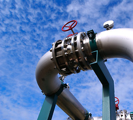 Image showing Equipment, cables and piping as found inside of a modern industr