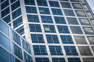 Image showing Blue glass office facade