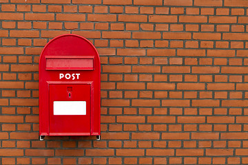 Image showing red mailbox on stone wall