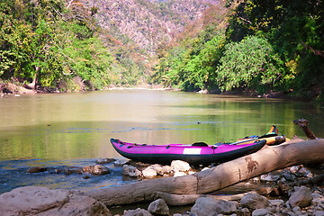 Image showing canoe on waters edge