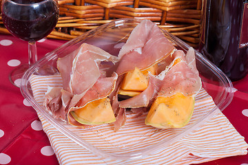 Image showing Cantaloupe melon with italian ham