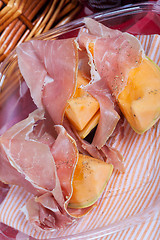 Image showing Cantaloupe melon with italian ham