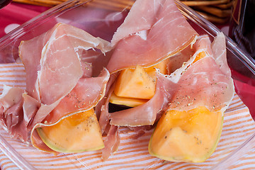 Image showing Cantaloupe melon with italian ham