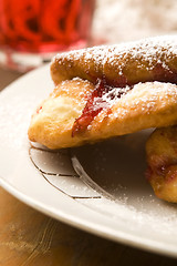 Image showing Sweet doughnuts with rose marmelade