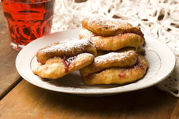 Image showing Sweet doughnuts with rose marmelade