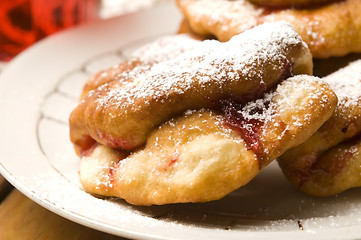 Image showing Sweet doughnuts with rose marmelade