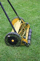 Image showing Lawn-mower used a rainy day