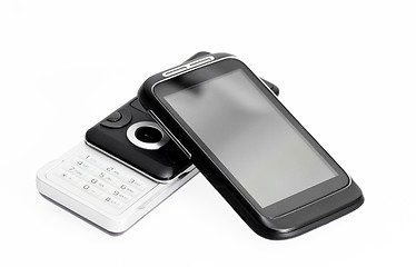 Image showing old phone and new smartphone on white background