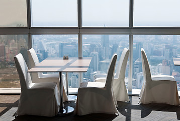 Image showing empty desk in a skyscraper restaurant