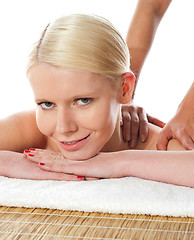 Image showing Closeup of a young woman having massage