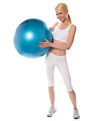 Image showing Healthy fit female athlete with a ball