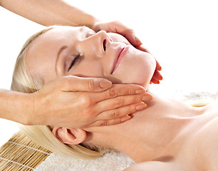 Image showing Gorgeous young woman relaxing in a spa salon