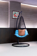 Image showing chair hanging on a chain in the hotel lobby