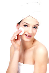 Image showing young beautiful woman with a towel doing wellness