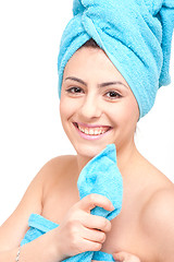 Image showing young beautiful woman with a towel doing wellness